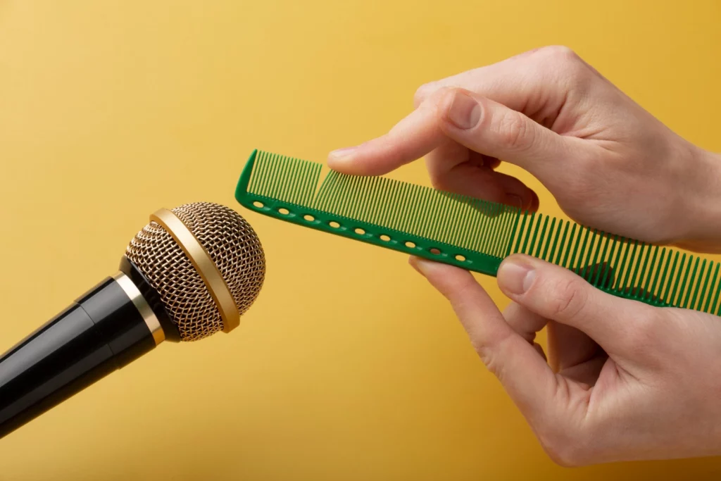 Using comb close to microphone for ASMR