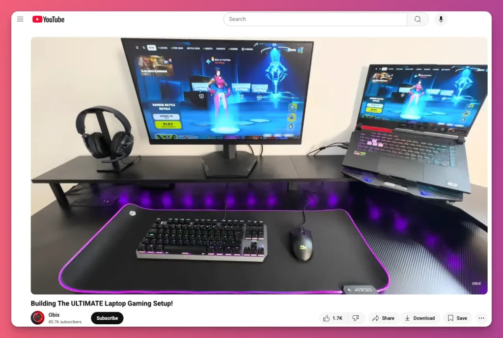 A dual monitor gaming setup with a laptop.