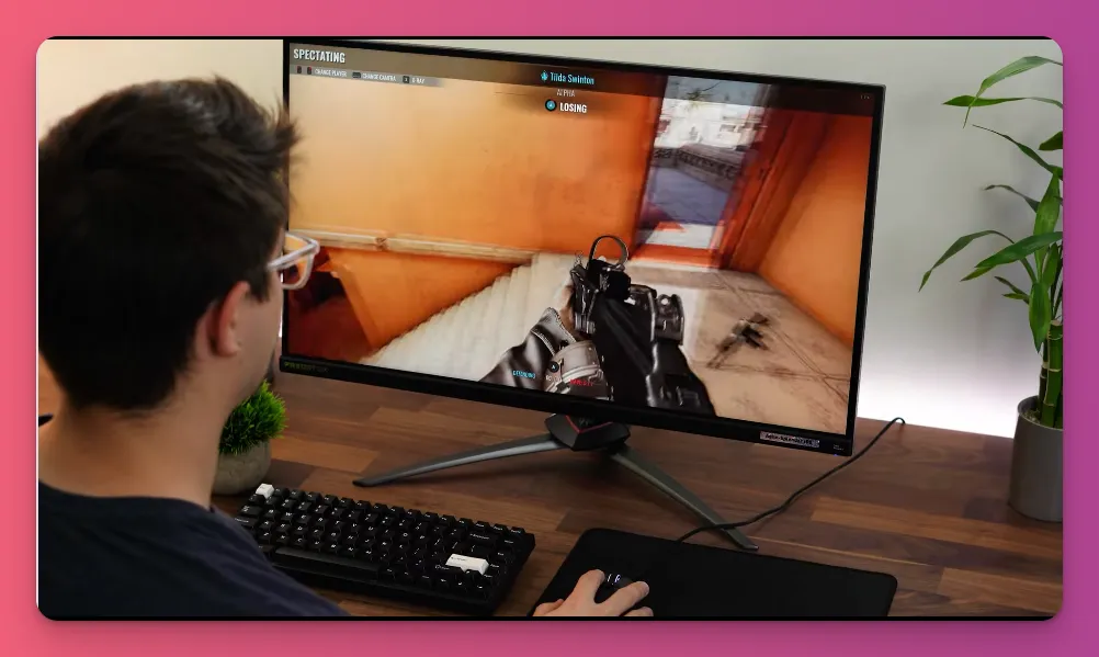 A gaming monitor setup with an Acer Predator XB283K, known for thin bezels that are ideal for a dual setup